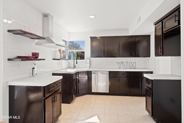 kitchen with backsplash, stainless steel dishwasher, dark brown cabinetry, and wall chimney range hood