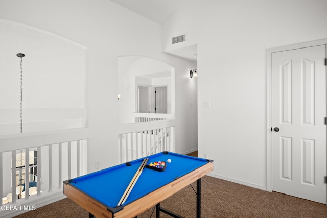 game room featuring vaulted ceiling and carpet flooring