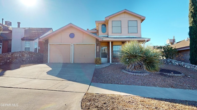 front of property with a garage