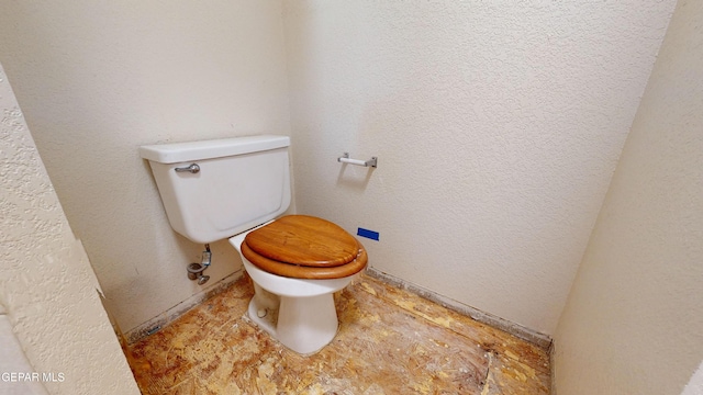 bathroom featuring toilet