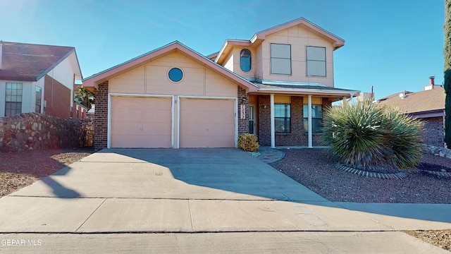 view of front of property with a garage