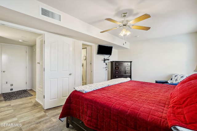 bedroom featuring ceiling fan