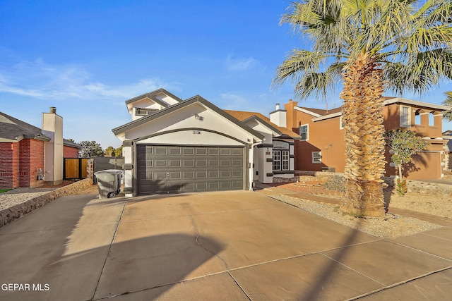 view of front of property with a garage