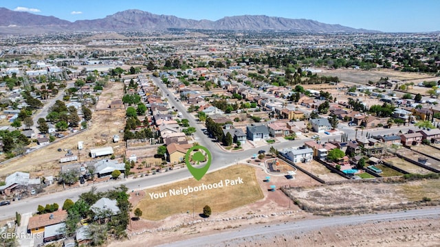 drone / aerial view featuring a mountain view