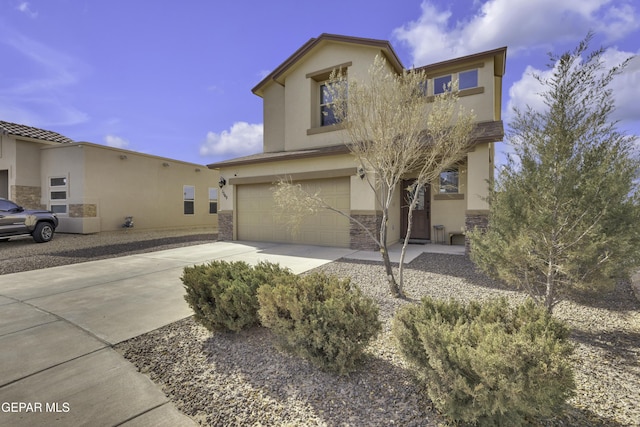 view of front of property with a garage