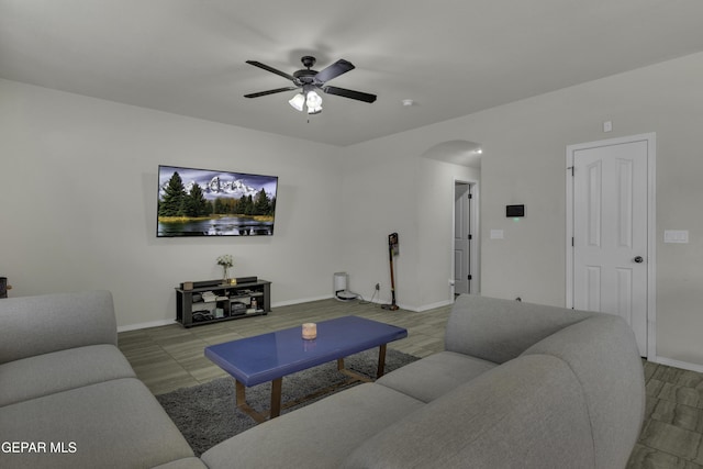 living room featuring ceiling fan