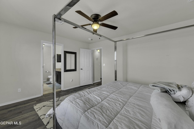 bedroom featuring ceiling fan, ensuite bathroom, and dark hardwood / wood-style floors