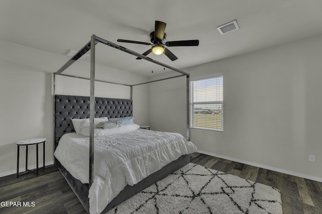 bedroom with dark wood-type flooring and ceiling fan