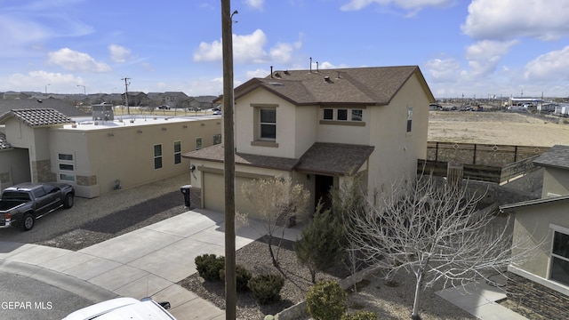 back of house featuring a garage