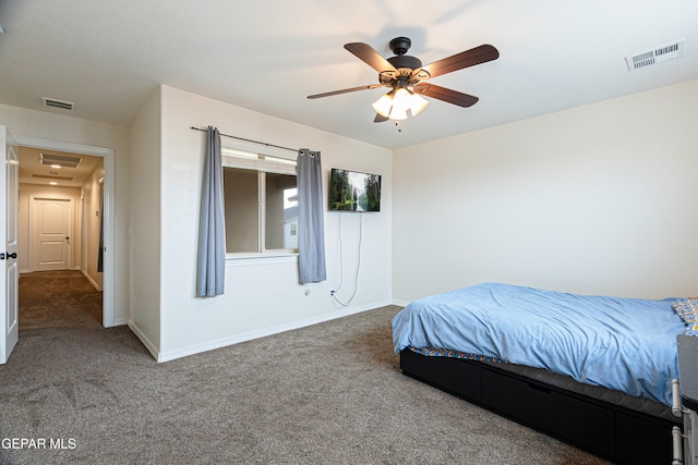 bedroom with ceiling fan and carpet