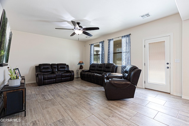 living room with ceiling fan