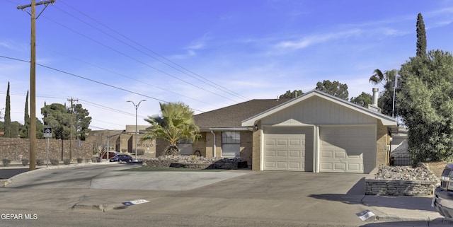 ranch-style home with a garage