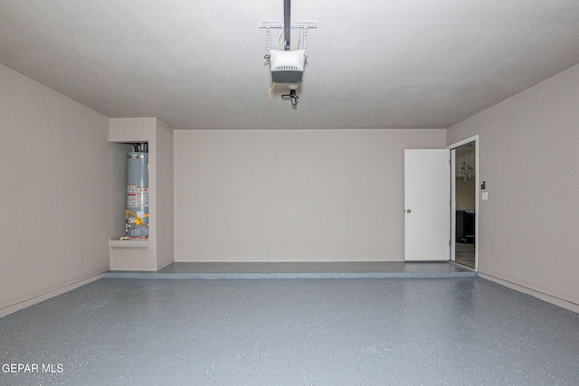 garage with a garage door opener and gas water heater