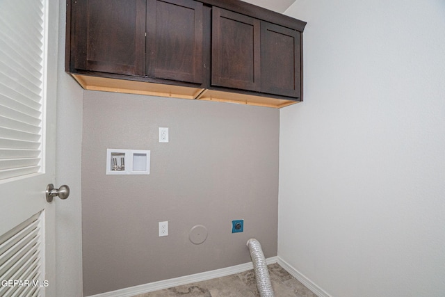 laundry area featuring electric dryer hookup, hookup for a gas dryer, hookup for a washing machine, and cabinets