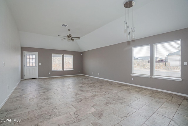 unfurnished room featuring ceiling fan and vaulted ceiling