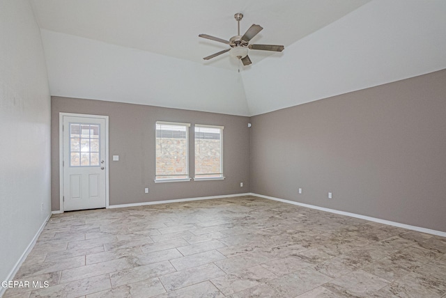 empty room with vaulted ceiling and ceiling fan