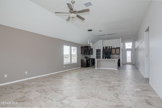 unfurnished living room with lofted ceiling and ceiling fan