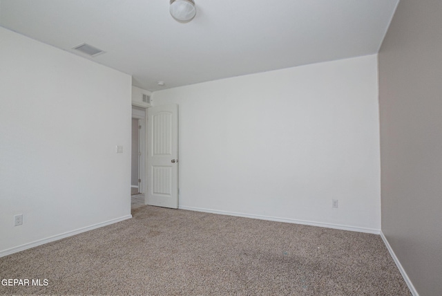 view of carpeted spare room