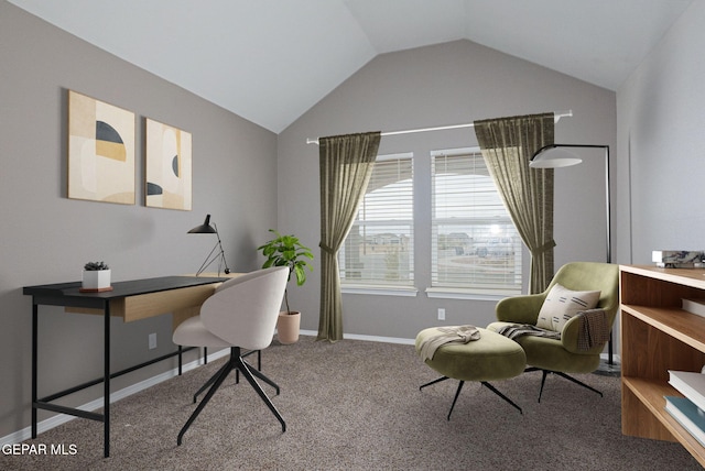 carpeted office featuring lofted ceiling