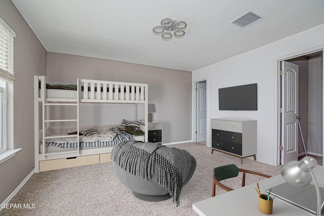 bedroom featuring carpet