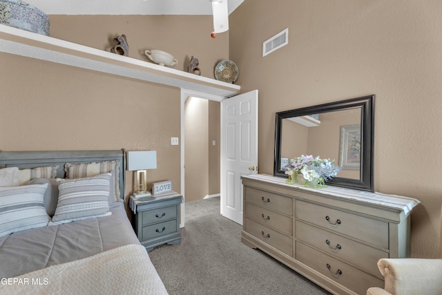 bedroom with light carpet