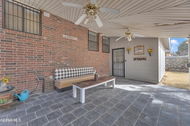 view of patio / terrace featuring ceiling fan