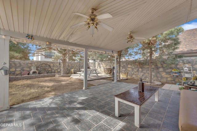 view of patio / terrace featuring ceiling fan