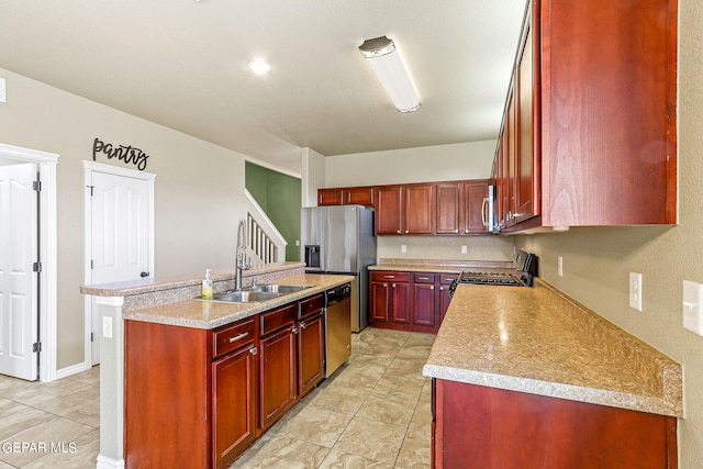 kitchen with sink, a kitchen island with sink, light tile patterned floors, light stone counters, and stainless steel appliances