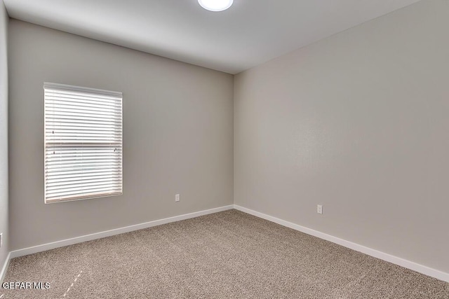 view of carpeted spare room