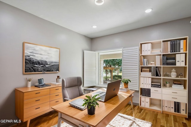909 Singing Hills Dr, El Paso, TX 79912 - home office featuring wood finished floors and recessed lighting