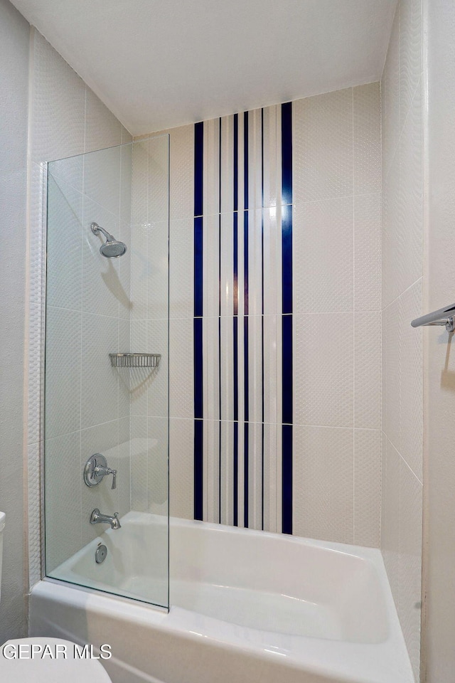 909 Singing Hills Dr, El Paso, TX 79912 - full bathroom featuring toilet and shower / bath combination with glass door