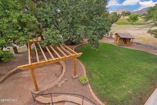909 Singing Hills Dr, El Paso, TX 79912 - view of yard featuring a mountain view and an outdoor structure