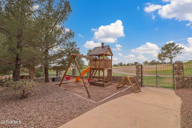 909 Singing Hills Dr, El Paso, TX 79912 - view of play area featuring fence and a gate