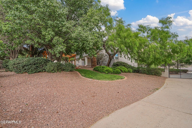 909 Singing Hills Dr, El Paso, TX 79912 - view of side of home featuring a gate and fence