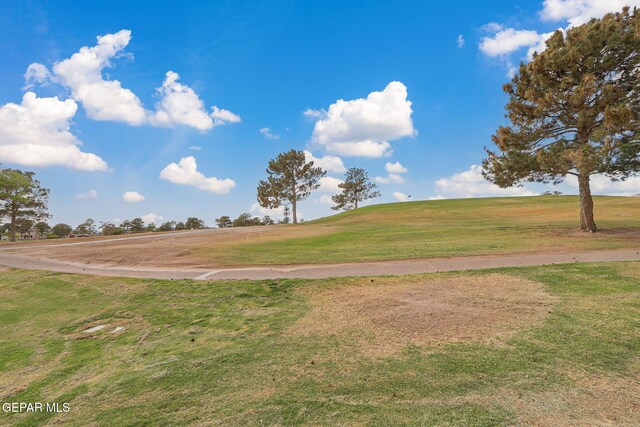 909 Singing Hills Dr, El Paso, TX 79912 - view of home's community featuring a yard