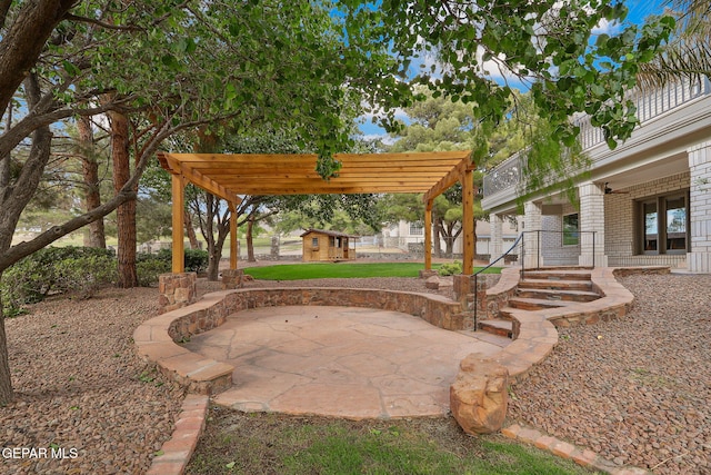 909 Singing Hills Dr, El Paso, TX 79912 - view of patio / terrace with an outbuilding and a pergola
