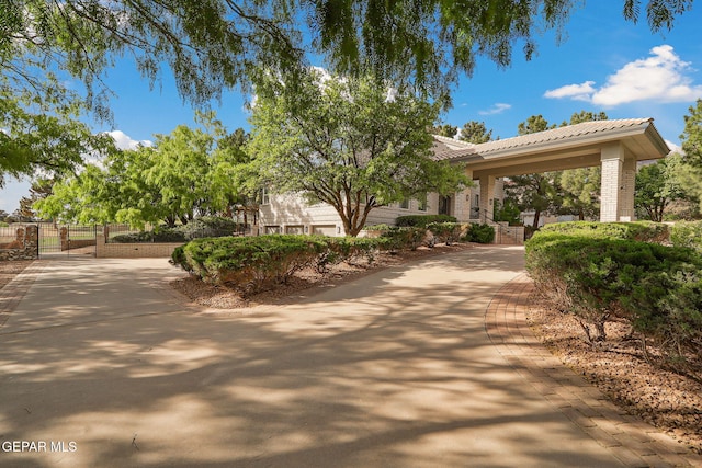909 Singing Hills Dr, El Paso, TX 79912 - surrounding community featuring a gate and fence