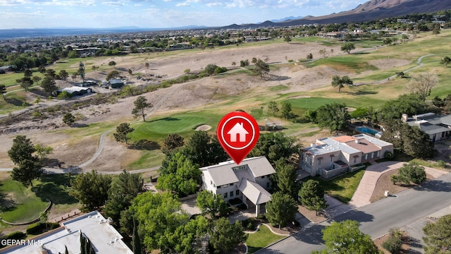 909 Singing Hills Dr, El Paso, TX 79912 - aerial overview of property's location featuring a golf course, mountains, and nearby suburban area