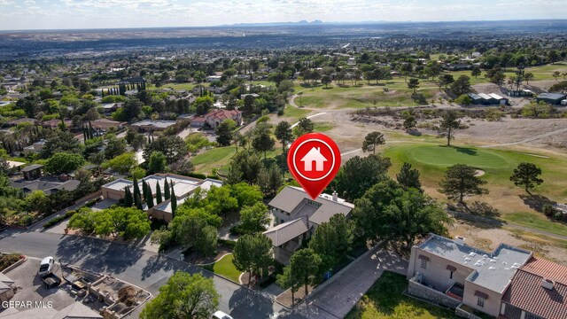 909 Singing Hills Dr, El Paso, TX 79912 - aerial perspective of suburban area with a golf course
