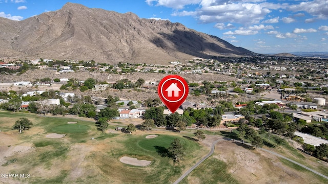 909 Singing Hills Dr, El Paso, TX 79912 - aerial overview of property's location with mountains, a golf club, and nearby suburban area