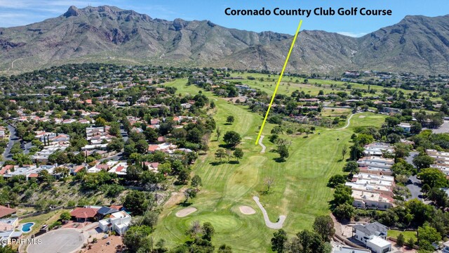 909 Singing Hills Dr, El Paso, TX 79912 - aerial view of residential area with a mountainous background and a local golf course