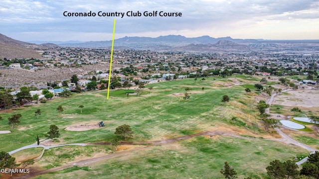 909 Singing Hills Dr, El Paso, TX 79912 - aerial view of property and surrounding area with a mountain backdrop and nearby suburban area