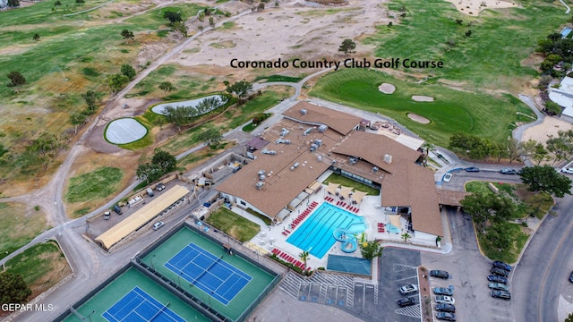909 Singing Hills Dr, El Paso, TX 79912 - aerial overview of property's location featuring a pool and a local golf course