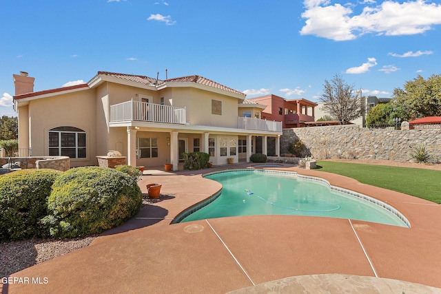 view of pool featuring a fenced in pool, fence, and a patio area