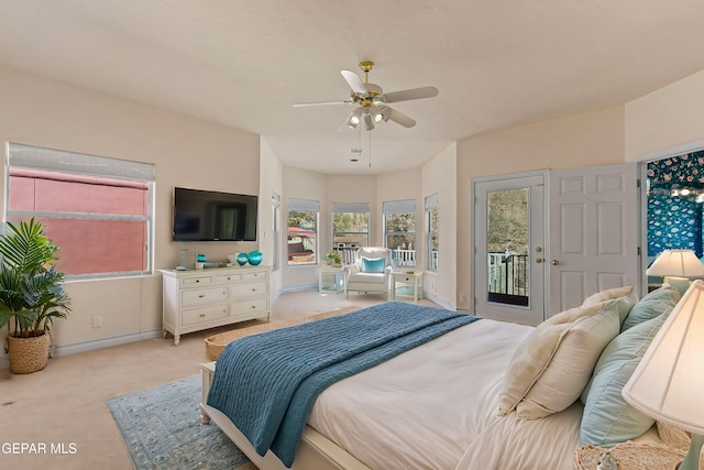 bedroom with baseboards, ceiling fan, access to outside, and light carpet