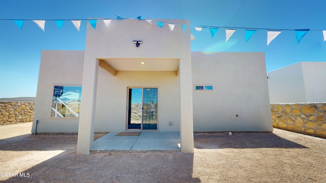 rear view of property with a patio