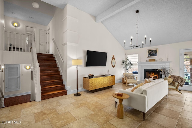 living room with beam ceiling, a wealth of natural light, a fireplace, and high vaulted ceiling