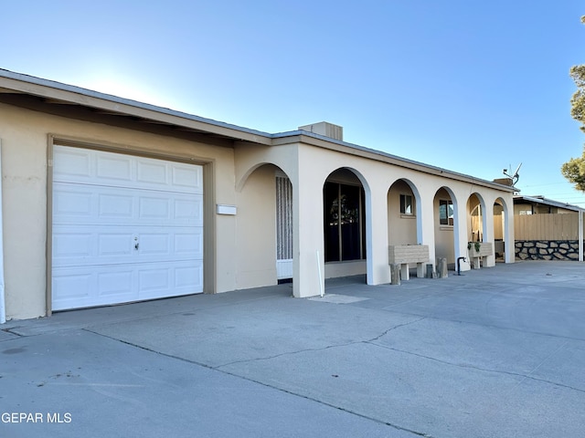 view of front of property featuring a garage