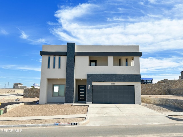 modern home featuring a garage