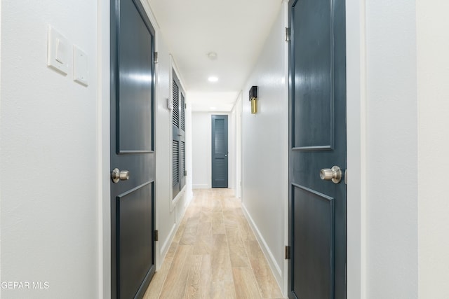 corridor featuring light wood-type flooring